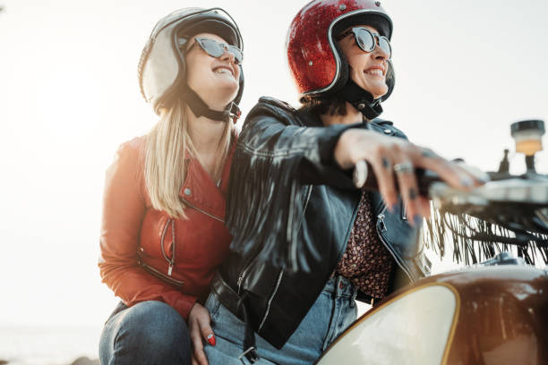 istock Women outdoors with motorbike 1484791029