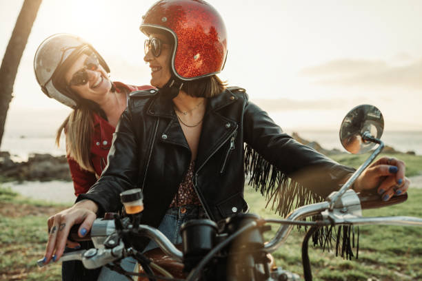 istock Women outdoors with motorbike 1484791031