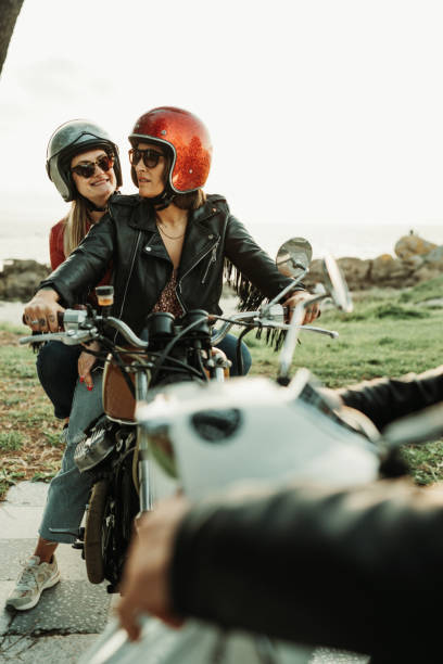 istock Friends outdoors with motorbike 1484791776