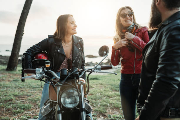 istock Friends outdoors with motorbike 1484791967