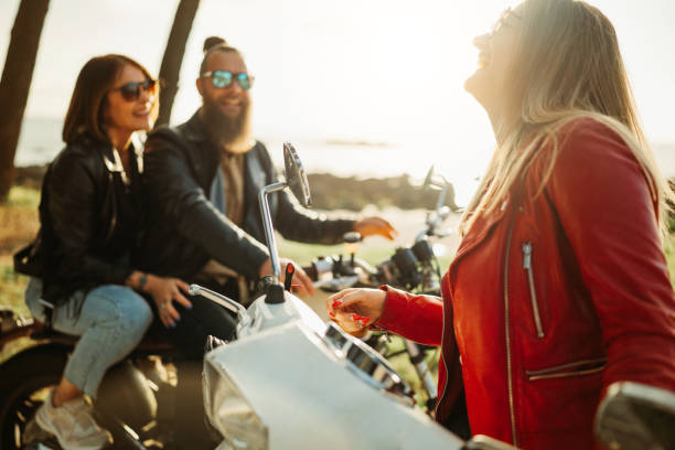 istock Friends outdoors with motorbike have fun 1484792237