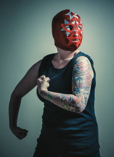 istock masked woman with tattoos 148479264