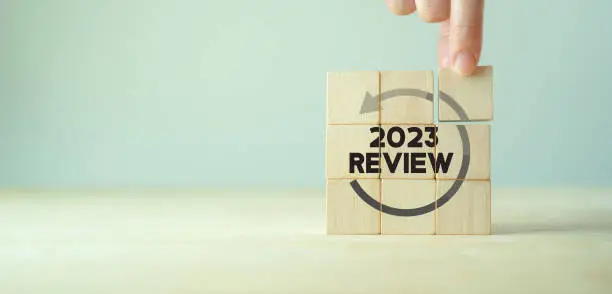 2023 Annual review, business and customer review. Review evaluation time for review inspection assessment auditing. Learning, improvement, planning and development. End of year business concept.