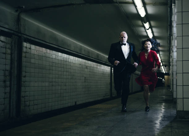 elegant couple running