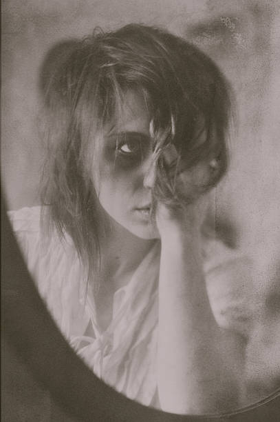 istock Reflection of Woman in Mirror 148479856