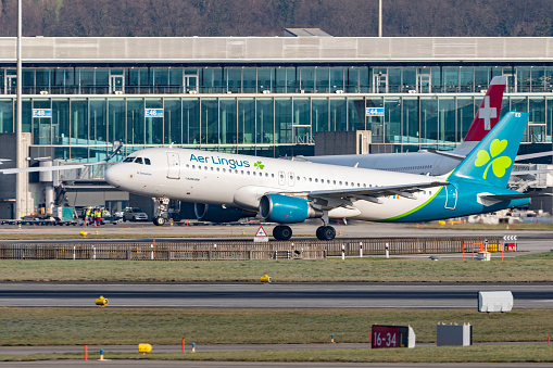 Zurich, Switzerland, January 20, 2023 Aer Lingus Airbus A320-214 aircraft is departing from runway 28
