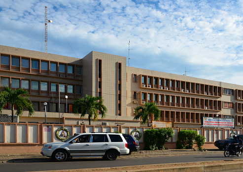 Cotonou, Benin: façade of the Ministry of Economy and Finance, Department of the Treasury and Public Accounting - The economy of Benin remains underdeveloped and dependent on subsistence agriculture and cotton. Economic growth is partially hampered by insufficient reforms in public finance management and the country's poorly developed infrastructure.