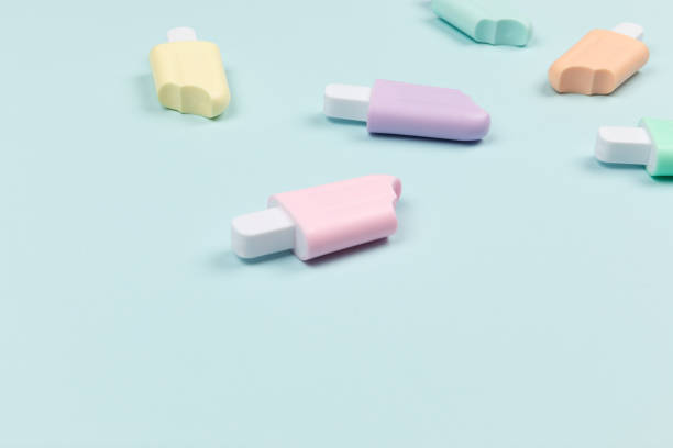 istock closeup of popsicles on cyan surface icecream 1484806631