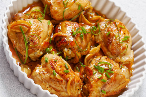 istock garlic rosemary thyme herbed baked chicken thighs 1484807205