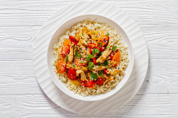 istock sweet and sour chicken with veggies and rice 1484807361