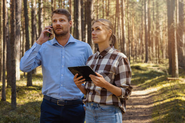 istock forest appraiser or buyer and owner doing property inspection 1484811608