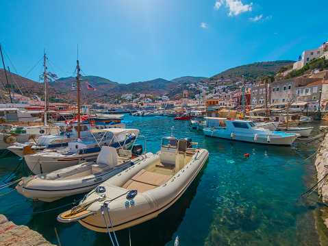 Boats moored in picturesque port of Hydra