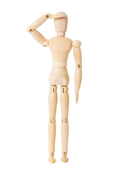 istock Wooden doll looks out 148481695