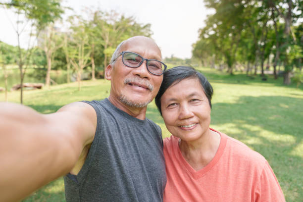 istock Asian Senior Chinese Couple taking selfie 1484816977
