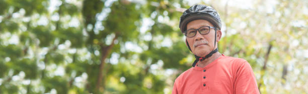 istock Asian Senior Cyclist man in black Helmet 1484817124
