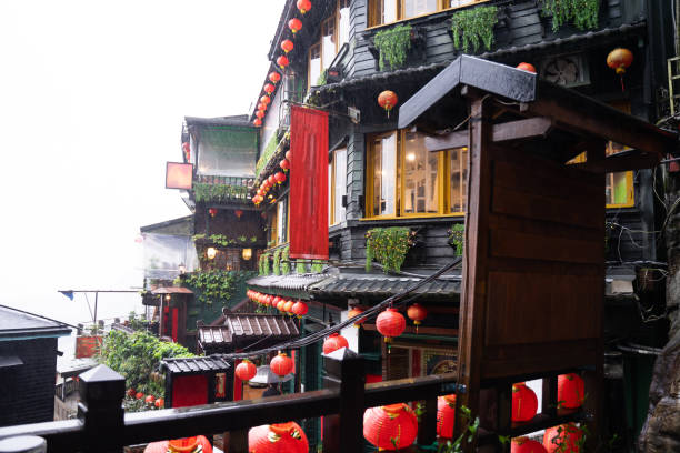 istock Chinese style cafe decorated with red lanterns, the sky is cloudy and rainy 1484819789