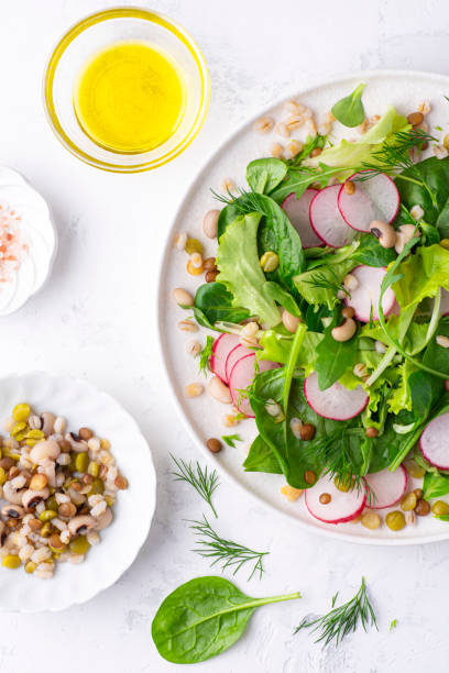 istock Light, dietary salad with bulgur, fresh spinach, radish, arugula and various types of greens. Dietary healthy balanced nutrition, vegan recipes. Nord Africa, French recipes , close up 1484821505