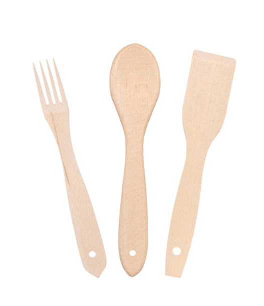 istock Wooden spoon, fork and spatula on a white isolated background 1484827882