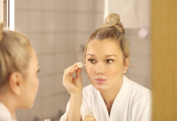 istock Applying the cream.Magic anti-aging cream. 1484827943