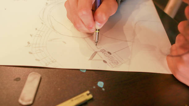istock An Asian male student at an art school is working on a design assignment 1484827967
