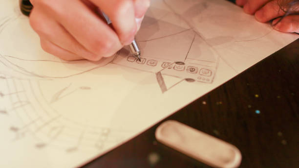istock An Asian male student at an art school is working on a design assignment 1484828005