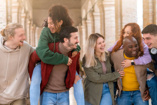 istock Multiracial friends group having fun in city stret 1484828113