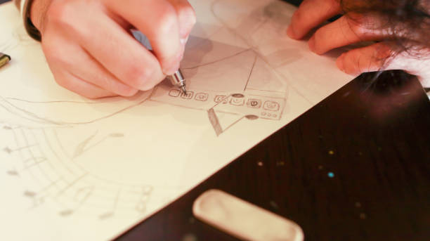istock An Asian male student at an art school is working on a design assignment 1484828271