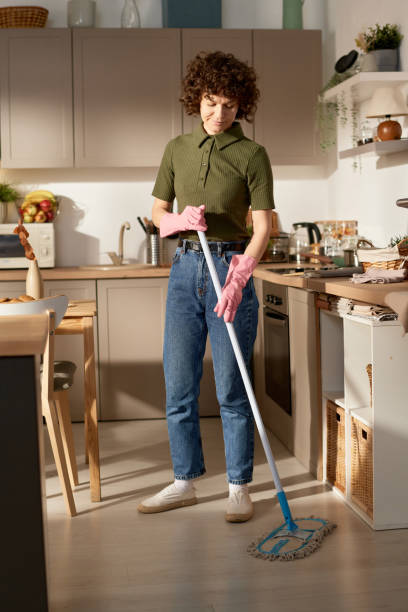 istock Woman cleaning the floor in the kitchen 1484829759