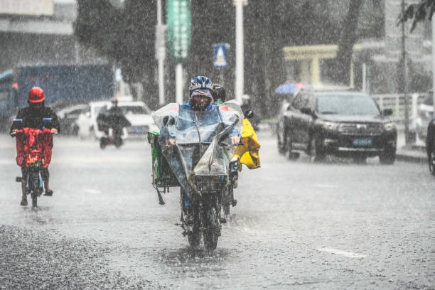 On April 24, 2023, in Dongguan City, Guangdong Province, China, a delivery driver was riding an electric bicycle to deliver food in heavy rain. At the same time, some Meituan delivery drivers in Guangdong Province were on strike because Meituan had suspended the \