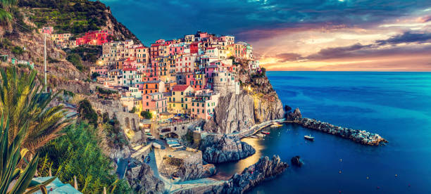 Manarola in Cinque Terre, Italy panorama at sunset. Popular tourist destination in Liguria coast.