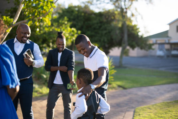 istock Brothers chatting outside church 1484833467