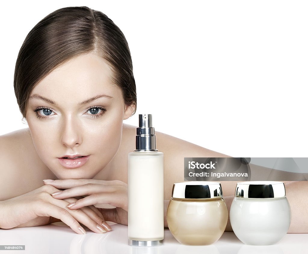 skincare products young woman and skincare products. Space for text. Adult Stock Photo