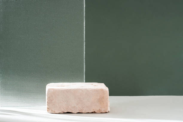 istock Composition empty podium material glass geometric shape. Pastel green background. Beautiful background made of natural materials for product presentation. 1484841154