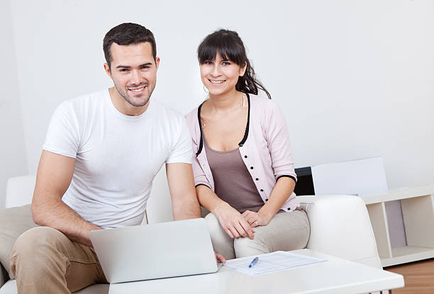 istock Young couple shopping in internet 148484409