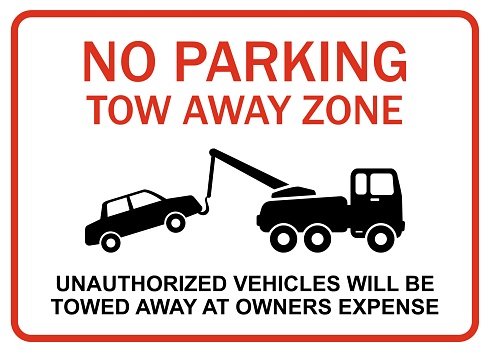 Unauthorized vehicles will be towed away at owners expense. Traffic sign as vector graphic and clipart.