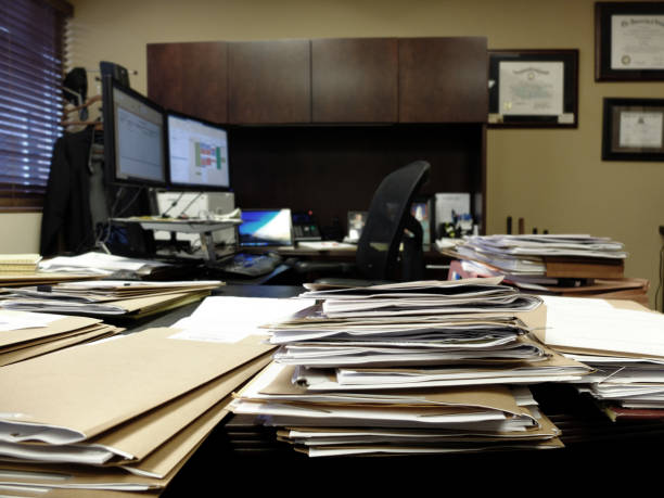 istock Lawyer Messy Office Desk with Files and Papers Computer 1484848274