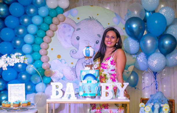 istock Happy mom at baby shower celebration 1484852916