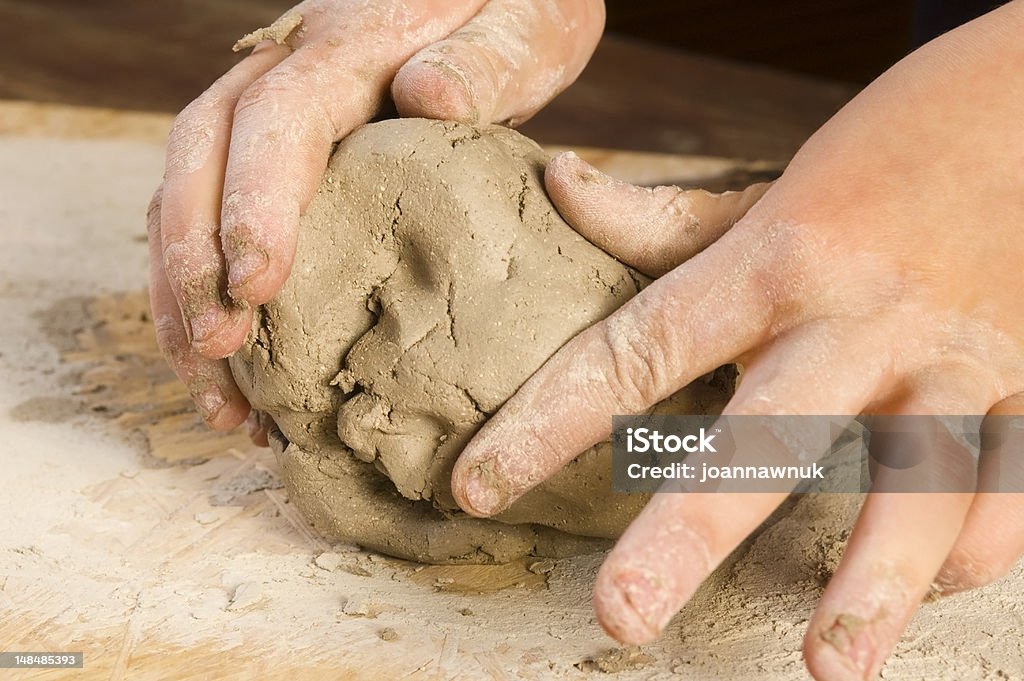 Child hands of a potter Child's Play Clay Stock Photo