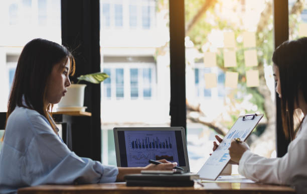 istock Discussing business analysis and financial planning. 1484855771