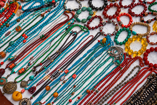Colorful gemstone necklaces and pendants for sale in the market