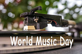 World Music Day, vinyl record. retro look whirling vinyl record player. close up selective focus