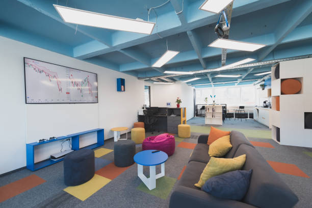 istock Photo of a modern office where programming, digital marketing and web design projects are done. Office with modern furniture and glass office 1484860091