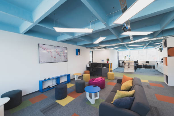 istock Photo of a modern office where programming, digital marketing and web design projects are done. Office with modern furniture and glass office 1484860214