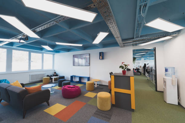 istock Photo of a modern office where programming, digital marketing and web design projects are done. Office with modern furniture and glass office 1484860361