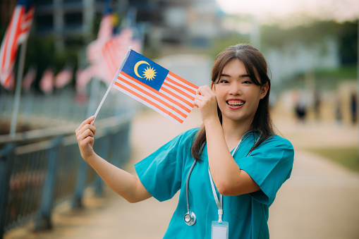 Malaysia National Flag waving under bright sky