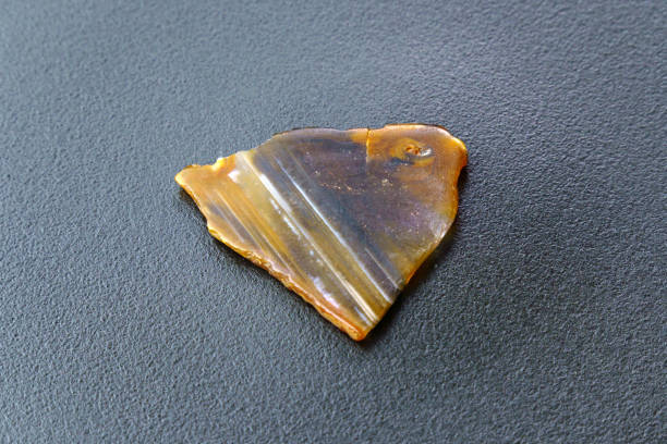 istock Agate Crystal cross section. Natural light translucent stone close up 1484862343