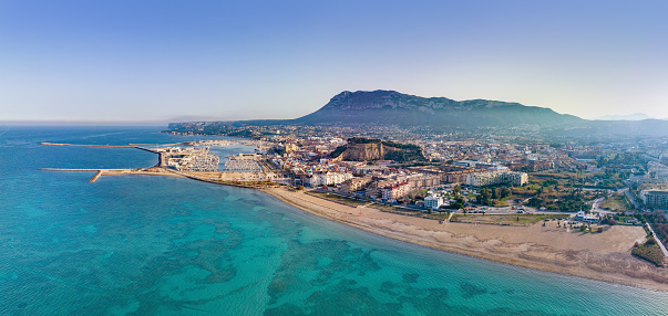 Denia aerial skyline in Mediterranean Alicante of Spain Drone point of view Costa Blanca with Montgo mountain background