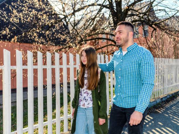 istock Father taking his daughter to school 1484863366