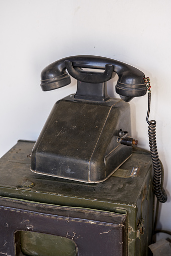 Close-up of an old traditional hand crank phone