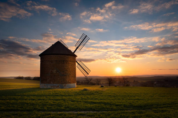 istock Beautiful old windmill and landscape with the sunset. 1484867087